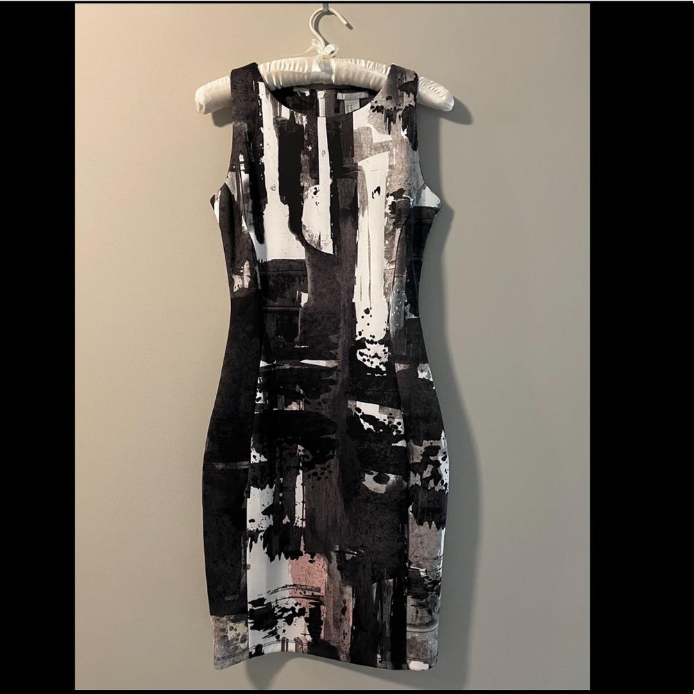XS dress from H&M. Black, white, grey, pink graphic print. Worn once.
